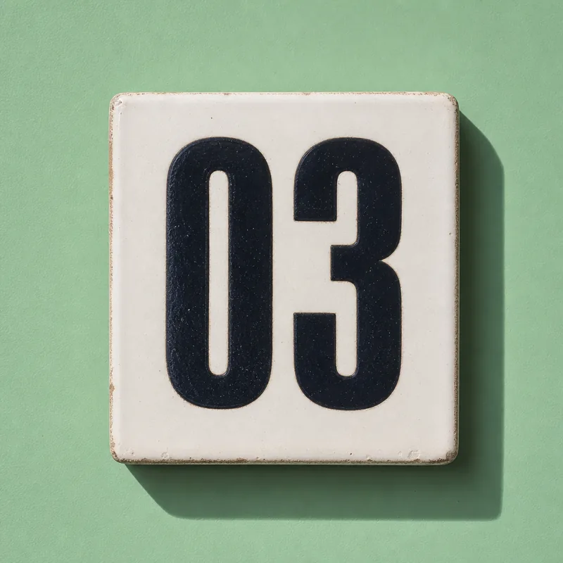 Ceramic tile numbered 03 on mint